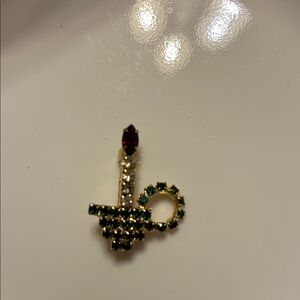 Elegant Gold and Green Women's Jewelry Piece